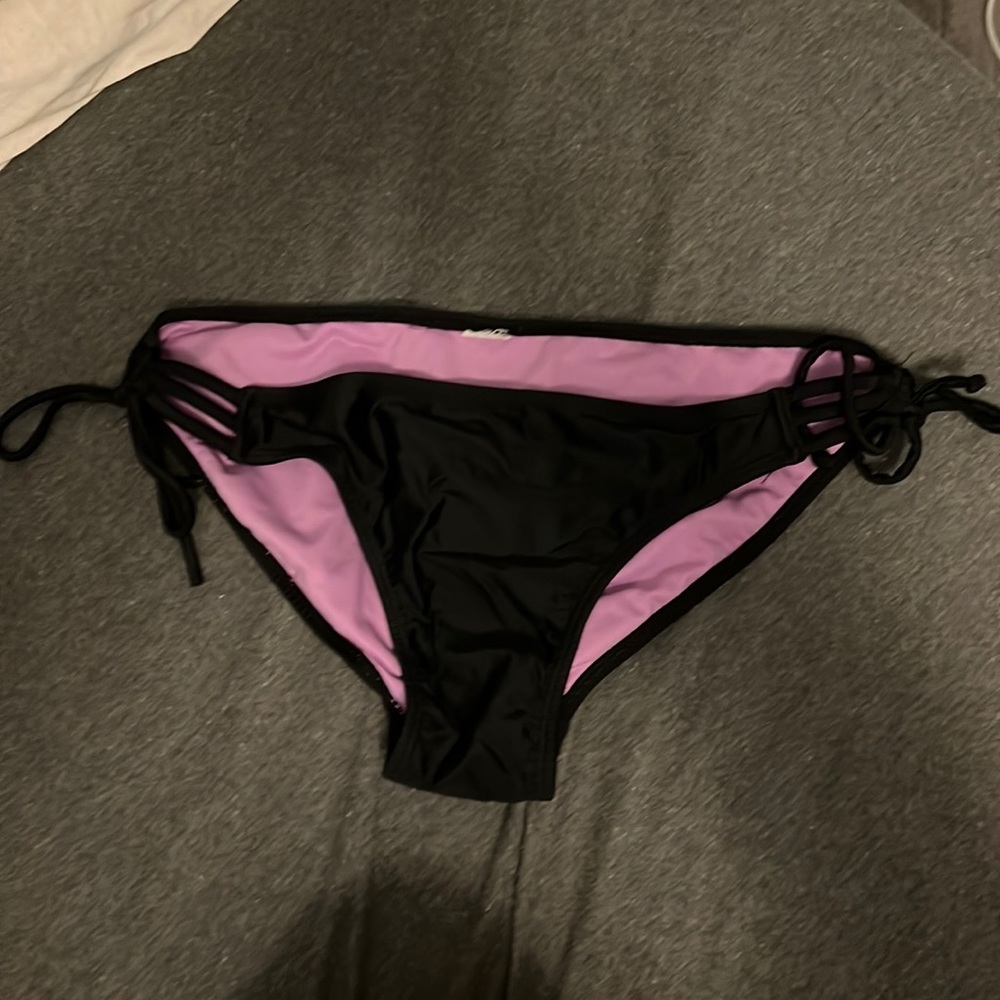 Size large bathing suit bottoms side tie